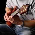 Man Playing Guitar